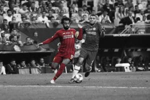 Salah running with the ball