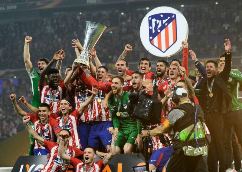 Atletico players and staff celebrate after the UEFA Europa League Final between Olympique de Marseille and Atletico de Madrid at Stade de Lyon.