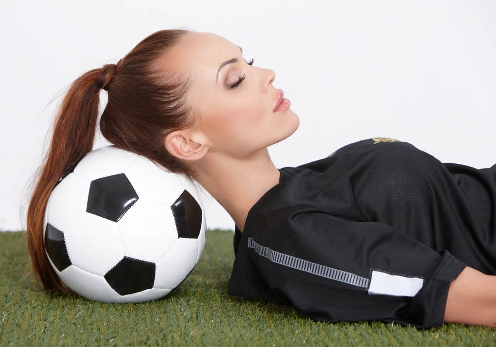 Woman with soccer ball