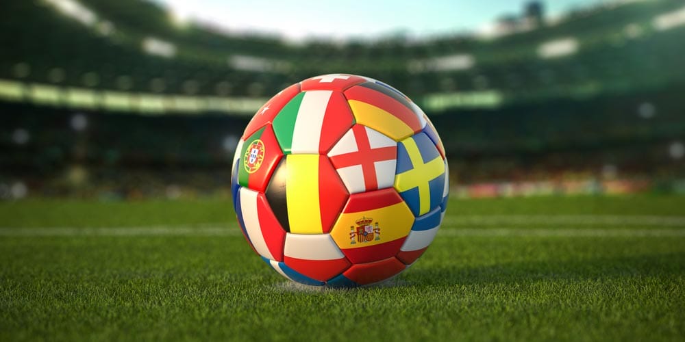 Soccer Football ball with flags of european countries on the grass of football stadium. Championship in Europe 2021. 3d illustration