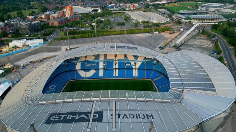 Manchester city football stadium Etihad from above - MANCHESTER, UNITED KINGDOM - AUGUST 15, 2022